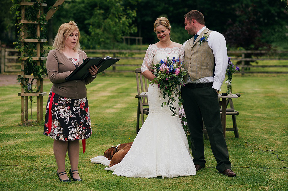 Tartan shoes and a Flowerdog for a Homemade Farm Wedding in Northumberland. Photography by Anna Urban.