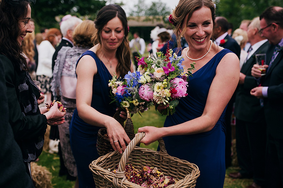 Tartan shoes and a Flowerdog for a Homemade Farm Wedding in Northumberland. Photography by Anna Urban.