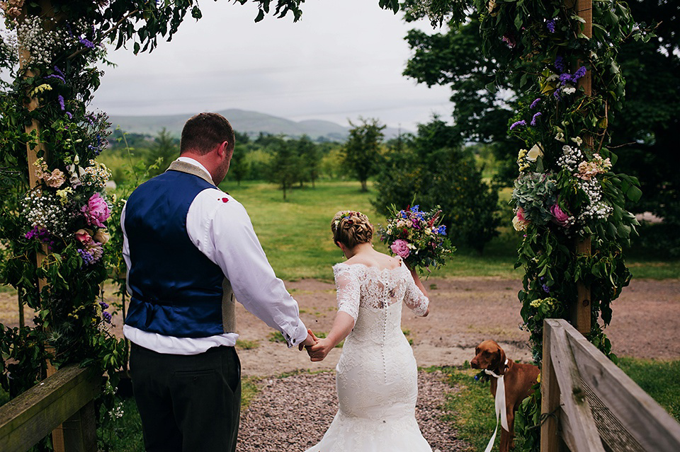 Tartan shoes and a Flowerdog for a Homemade Farm Wedding in Northumberland. Photography by Anna Urban.