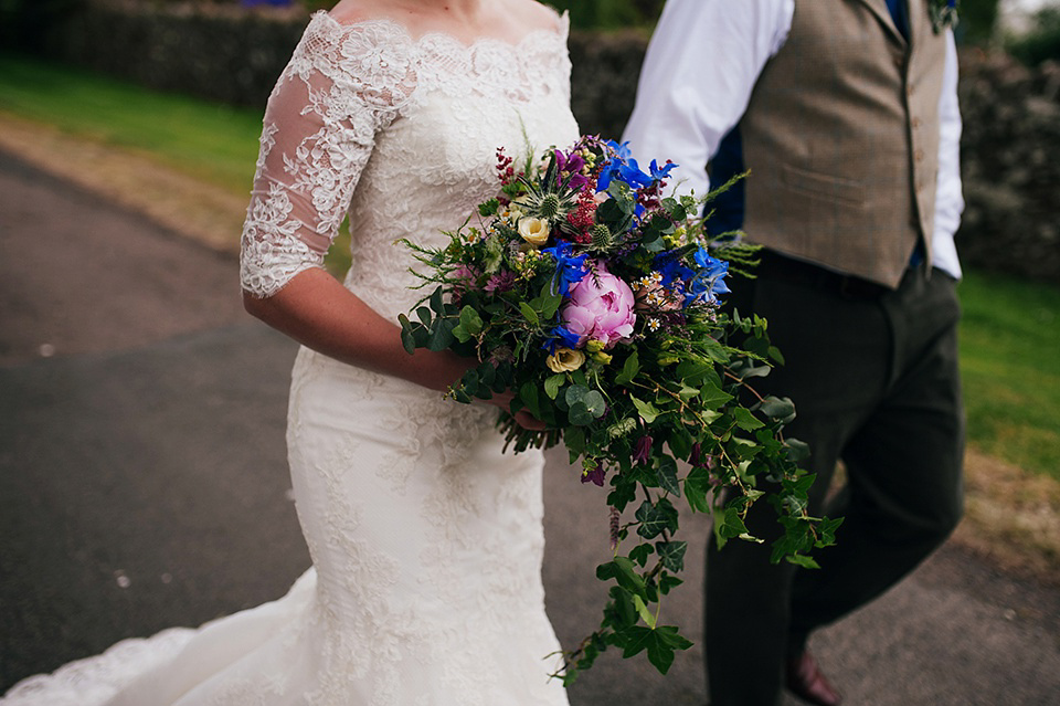 Tartan shoes and a Flowerdog for a Homemade Farm Wedding in Northumberland. Photography by Anna Urban.