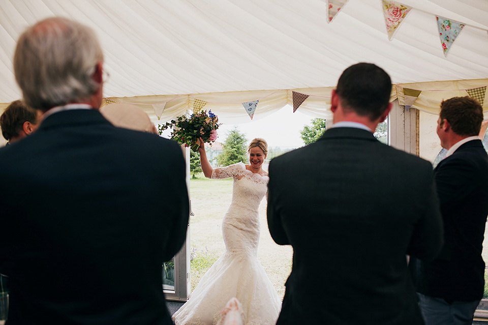 Tartan shoes and a Flowerdog for a Homemade Farm Wedding in Northumberland. Photography by Anna Urban.