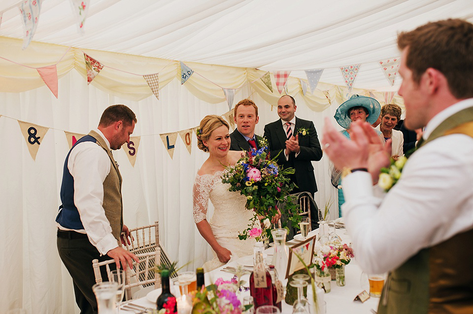 Tartan shoes and a Flowerdog for a Homemade Farm Wedding in Northumberland. Photography by Anna Urban.