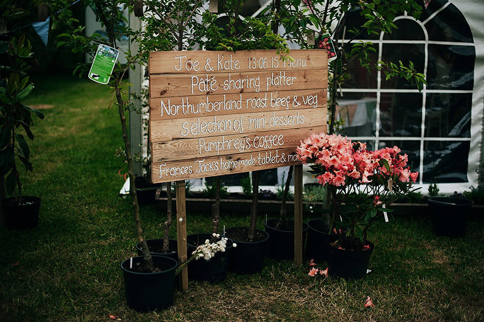 Tartan shoes and a Flowerdog for a Homemade Farm Wedding in Northumberland. Photography by Anna Urban.