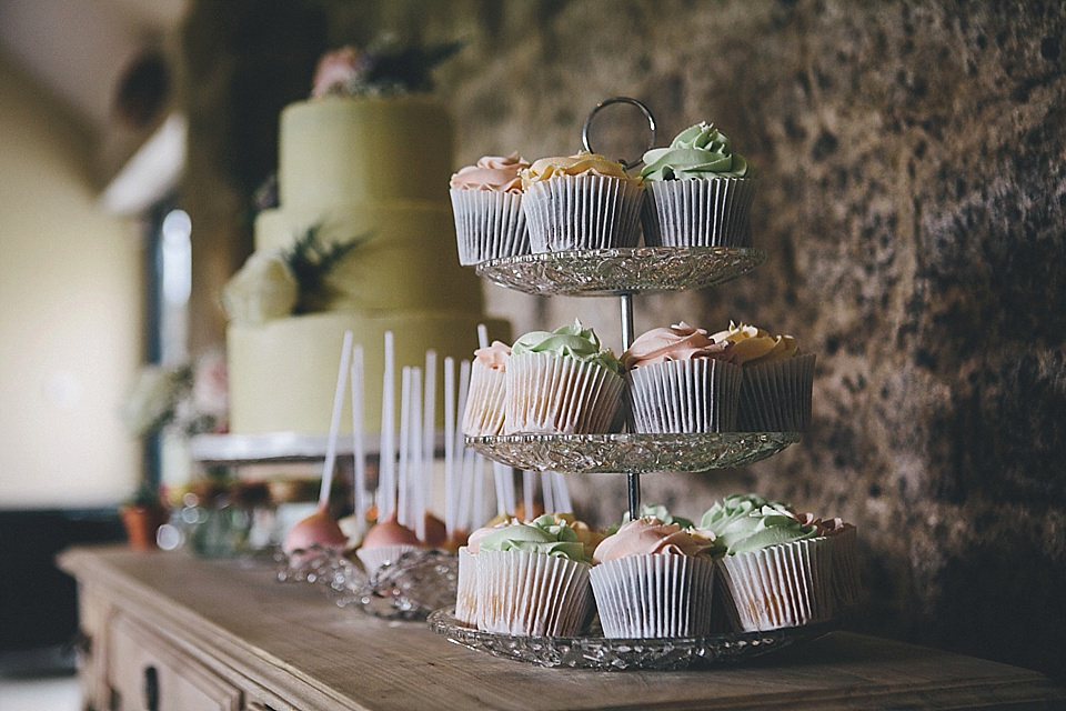 The bride wears Essense of Australia for her rustic wedding at Healey Barn, Northumberland. Photography by The Twins.