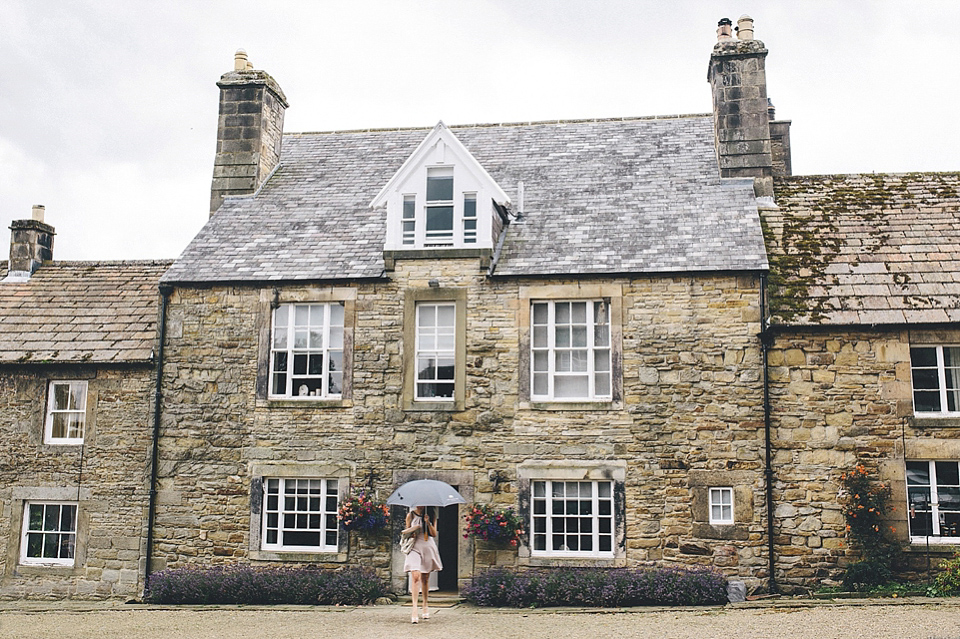 The bride wears Essense of Australia for her rustic wedding at Healey Barn, Northumberland. Photography by The Twins.