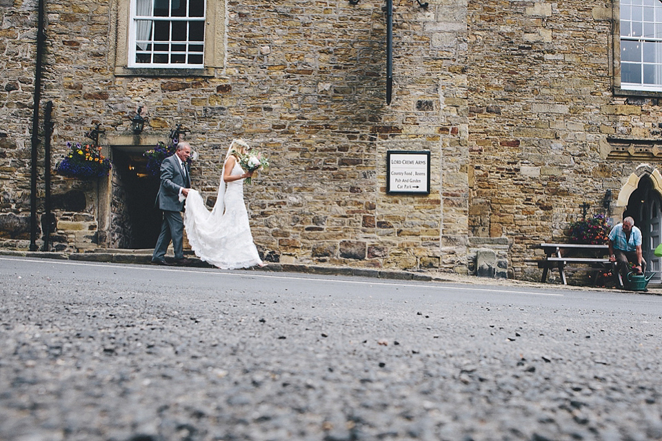 The bride wears Essense of Australia for her rustic wedding at Healey Barn, Northumberland. Photography by The Twins.