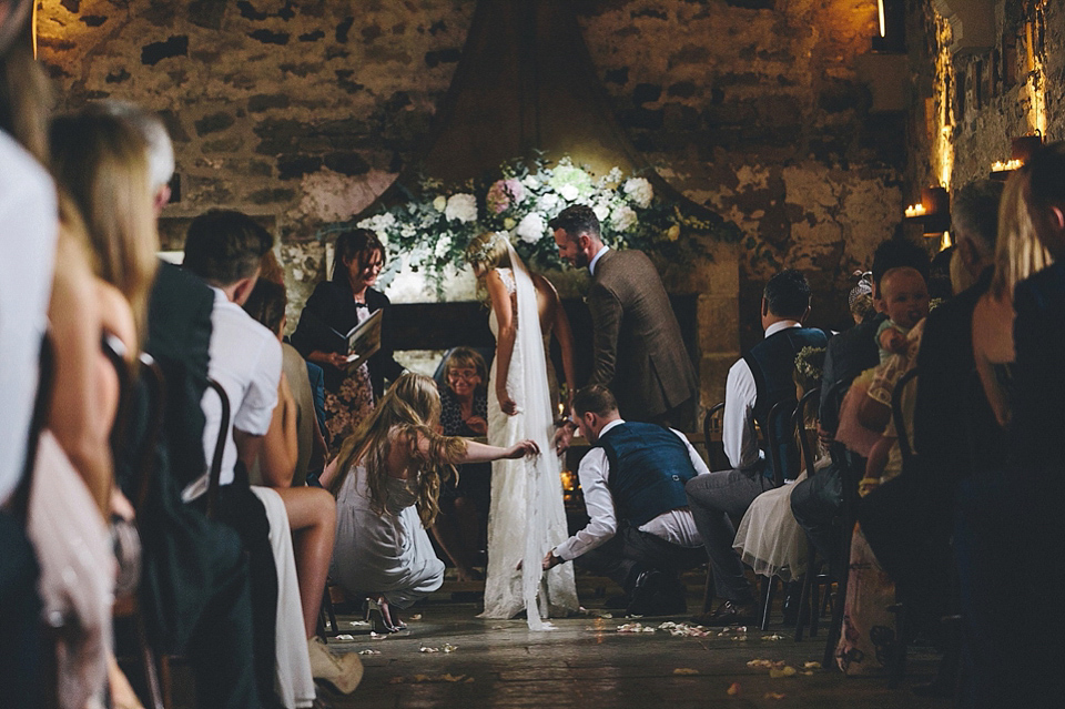 The bride wears Essense of Australia for her rustic wedding at Healey Barn, Northumberland. Photography by The Twins.