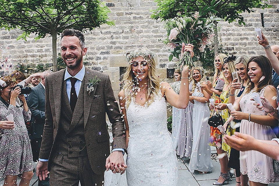 The bride wears Essense of Australia for her rustic wedding at Healey Barn, Northumberland. Photography by The Twins.