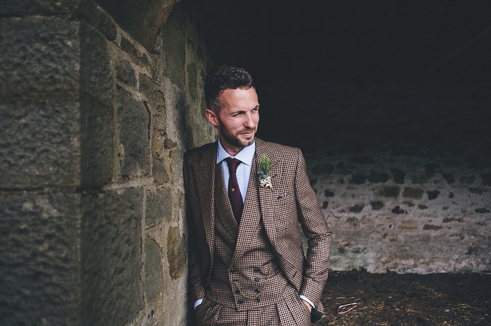 The bride wears Essense of Australia for her rustic wedding at Healey Barn, Northumberland. Photography by The Twins.