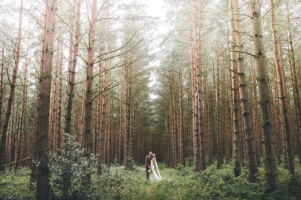 The bride wears Essense of Australia for her rustic wedding at Healey Barn, Northumberland. Photography by The Twins.