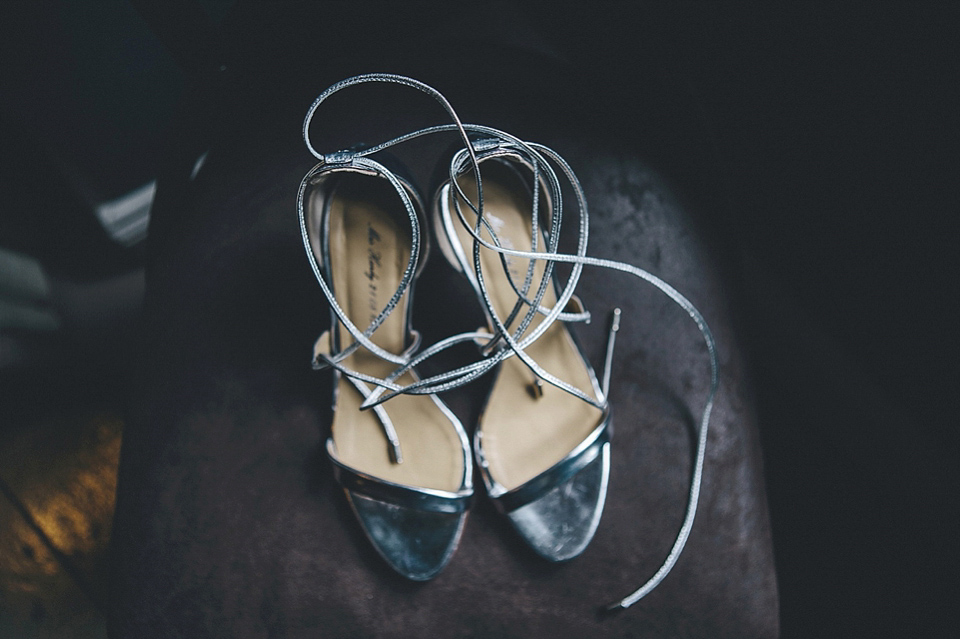 The bride wears Essense of Australia for her rustic wedding at Healey Barn, Northumberland. Photography by The Twins.