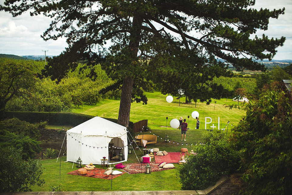 Bride Pip wore a handmade dress for her rustic wedding on her parent's Orchard farm. Photography by S6 Photography.