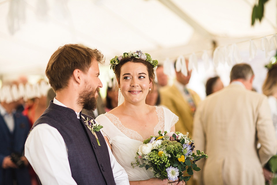 Bride Pip wore a handmade dress for her rustic wedding on her parent's Orchard farm. Photography by S6 Photography.