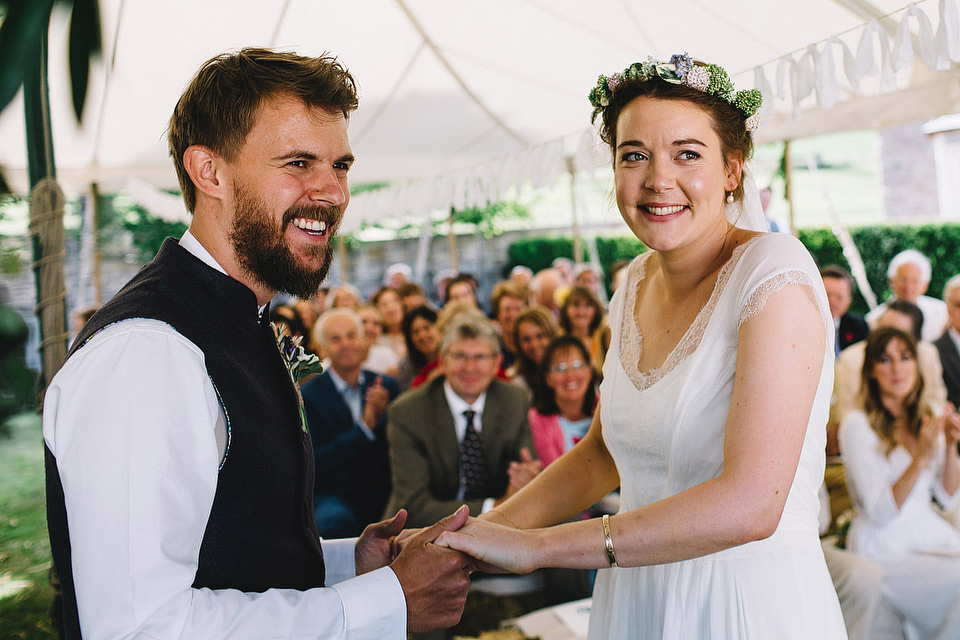 Bride Pip wore a handmade dress for her rustic wedding on her parent's Orchard farm. Photography by S6 Photography.