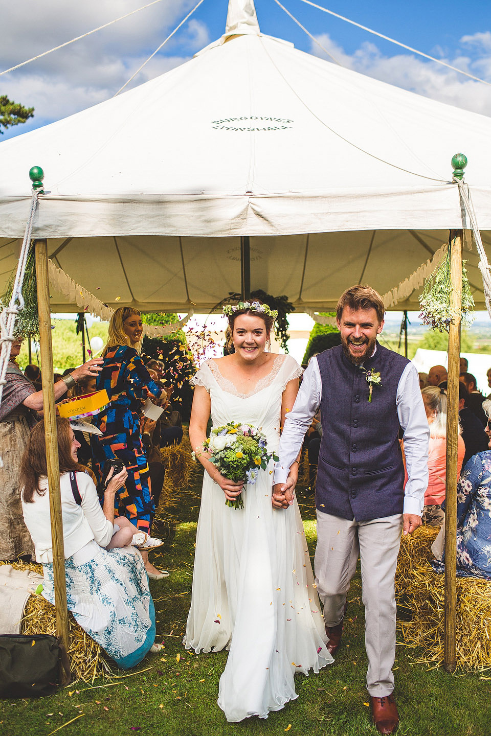 Bride Pip wore a handmade dress for her rustic wedding on her parent's Orchard farm. Photography by S6 Photography.