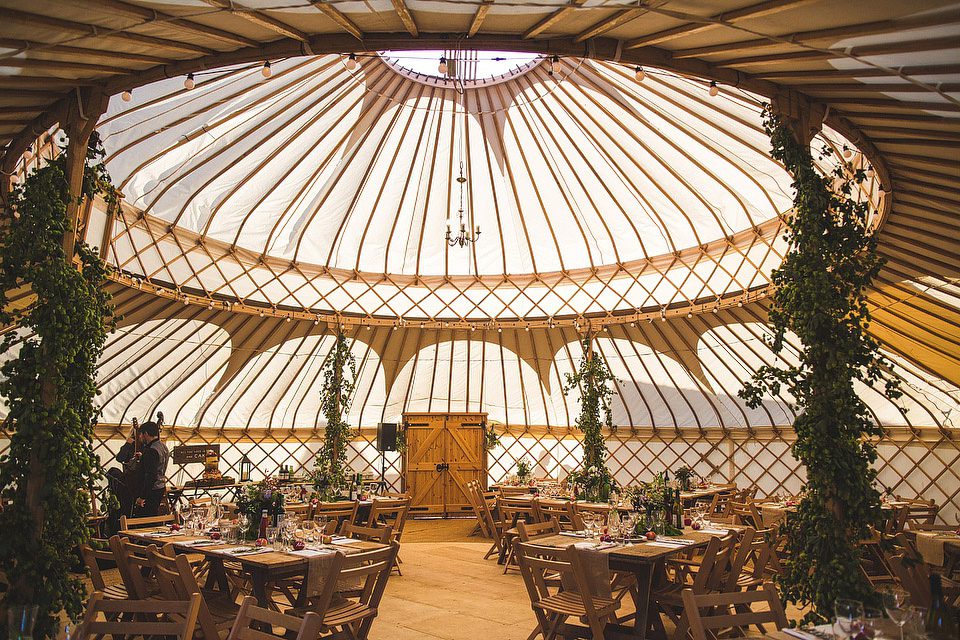 Bride Pip wore a handmade dress for her rustic wedding on her parent's Orchard farm. Photography by S6 Photography.