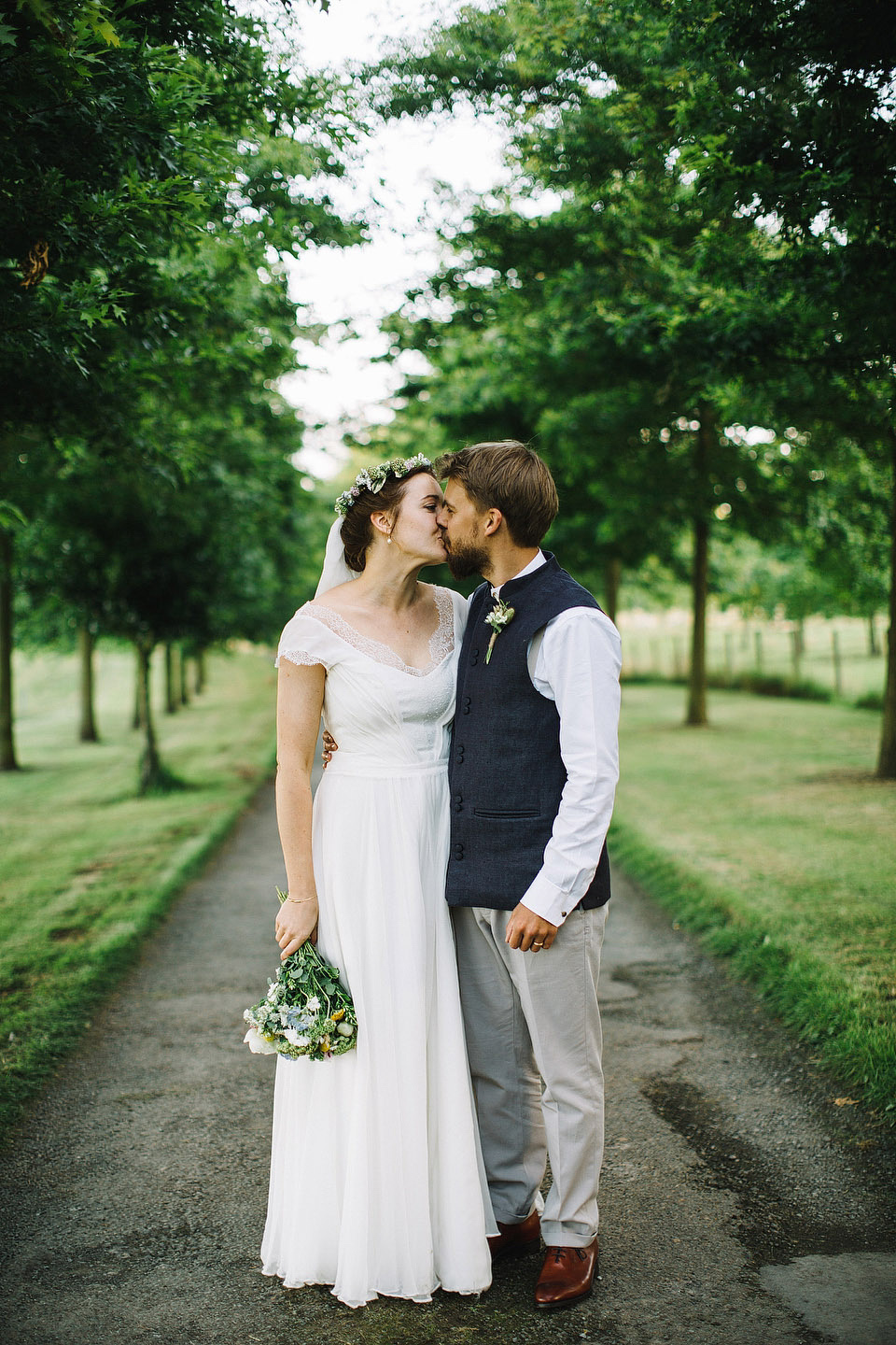 Bride Pip wore a handmade dress for her rustic wedding on her parent's Orchard farm. Photography by S6 Photography.