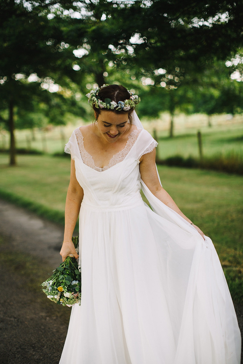 Bride Pip wore a handmade dress for her rustic wedding on her parent's Orchard farm. Photography by S6 Photography.