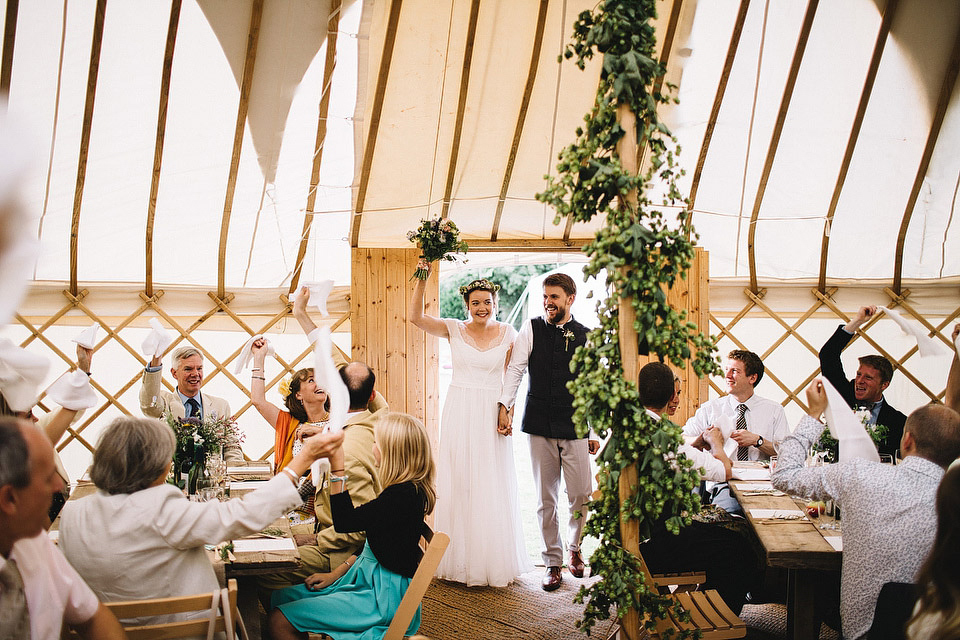 Bride Pip wore a handmade dress for her rustic wedding on her parent's Orchard farm. Photography by S6 Photography.