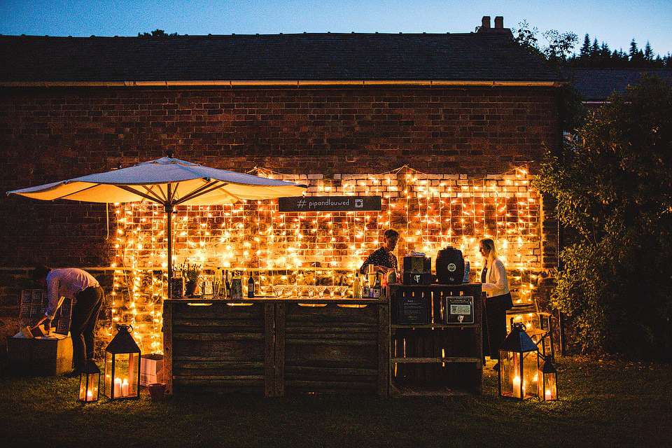 Bride Pip wore a handmade dress for her rustic wedding on her parent's Orchard farm. Photography by S6 Photography.