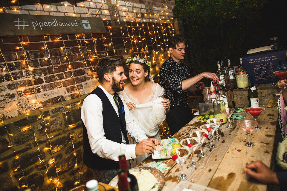 Bride Pip wore a handmade dress for her rustic wedding on her parent's Orchard farm. Photography by S6 Photography.