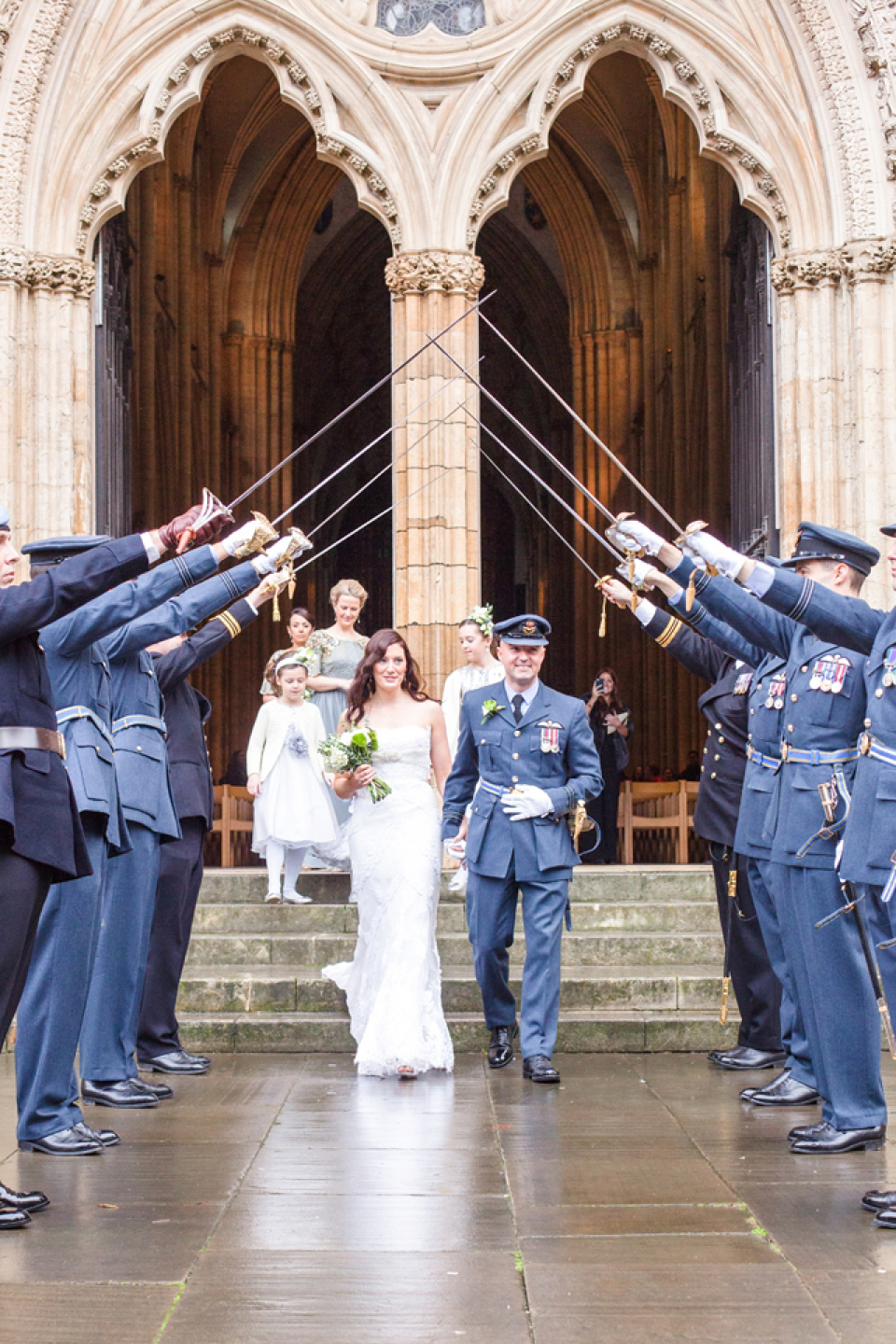 A Blue Hooded Cape for a Winter Military Wedding at York Minster. Photography by Cecelina Photography.