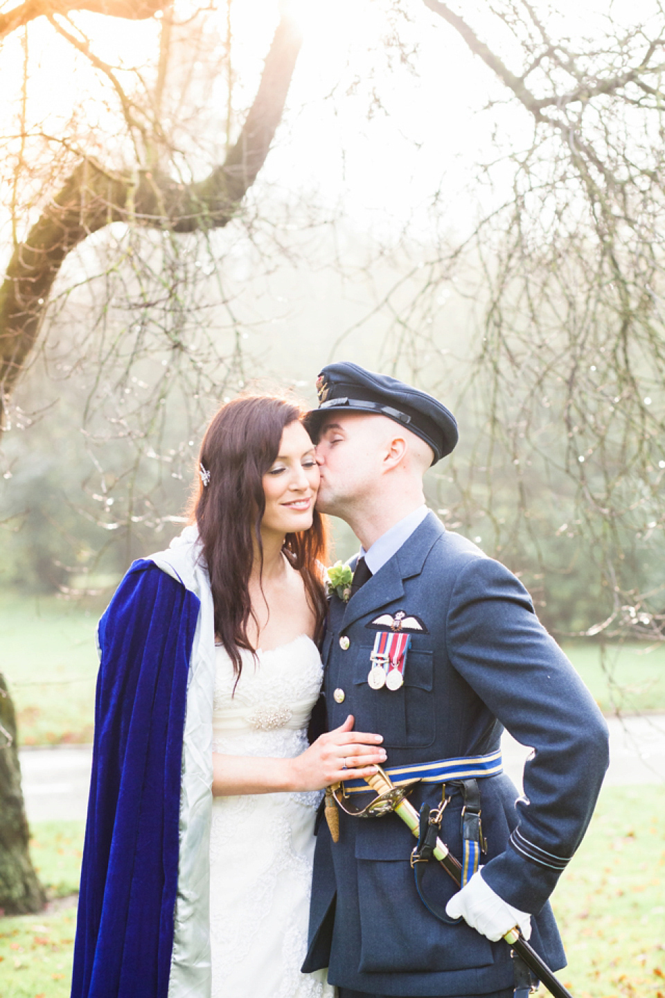 A Blue Hooded Cape for a Winter Military Wedding at York Minster. Photography by Cecelina Photography.