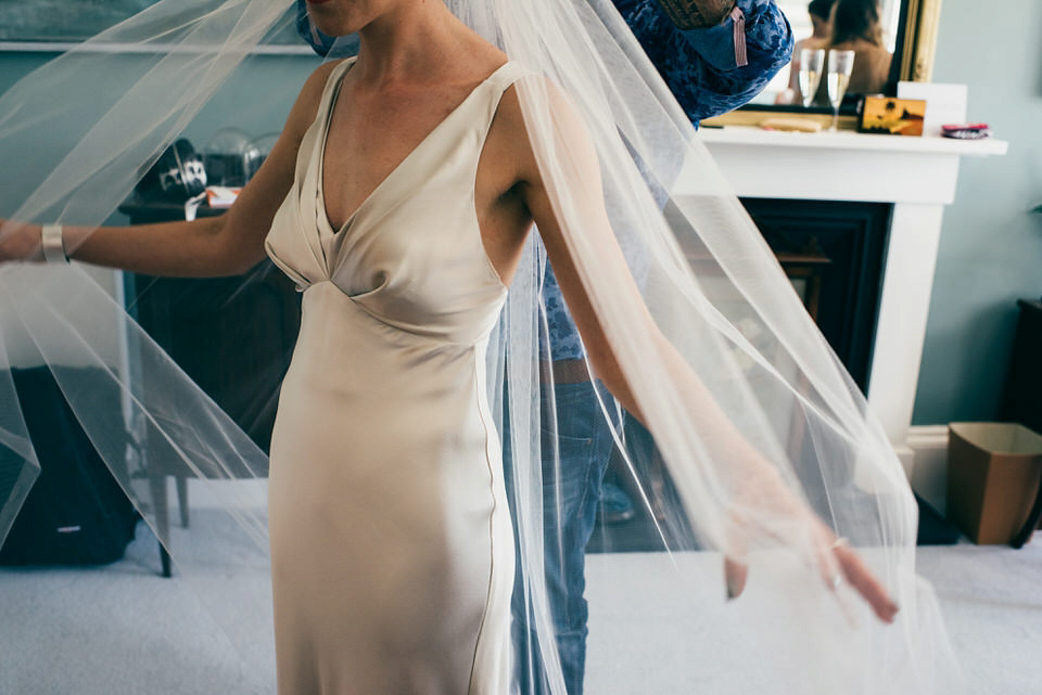 A Pleated Dress for a 1930's Inspired Kitsch and Glamorous City Wedding. Photography by Lisa Devine.
