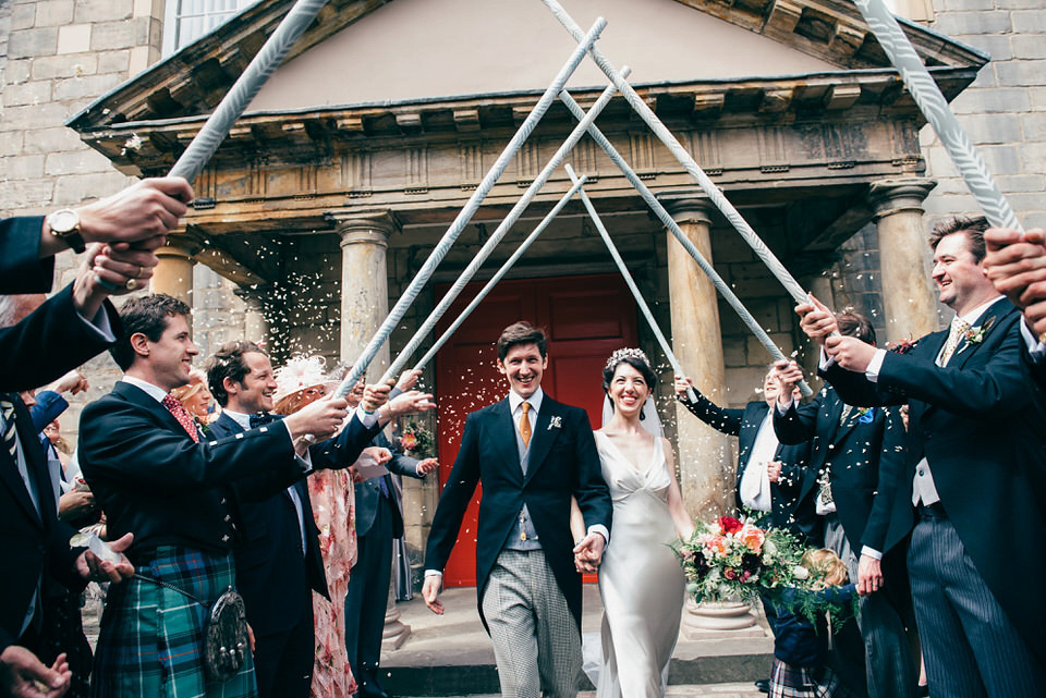 A Pleated Dress for a 1930's Inspired Kitsch and Glamorous City Wedding. Photography by Lisa Devine.