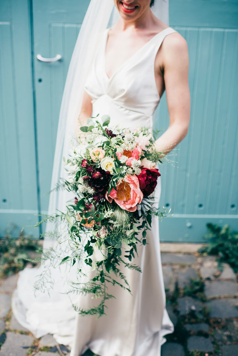 A Pleated Dress for a 1930's Inspired Kitsch and Glamorous City Wedding. Photography by Lisa Devine.