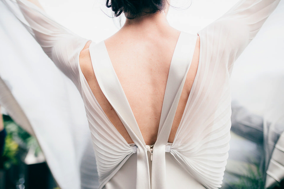 A Pleated Dress for a 1930's Inspired Kitsch and Glamorous City Wedding. Photography by Lisa Devine.