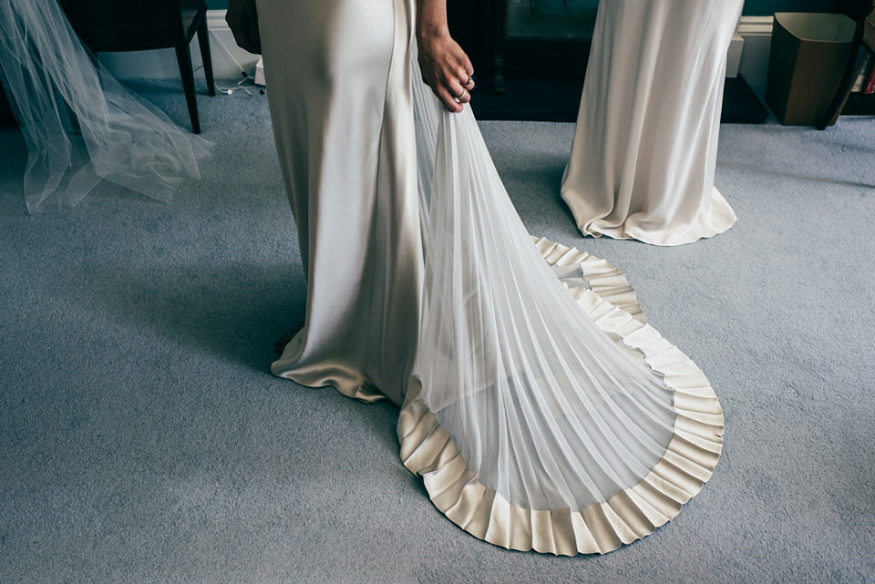 A Pleated Dress for a 1930's Inspired Kitsch and Glamorous City Wedding. Photography by Lisa Devine.