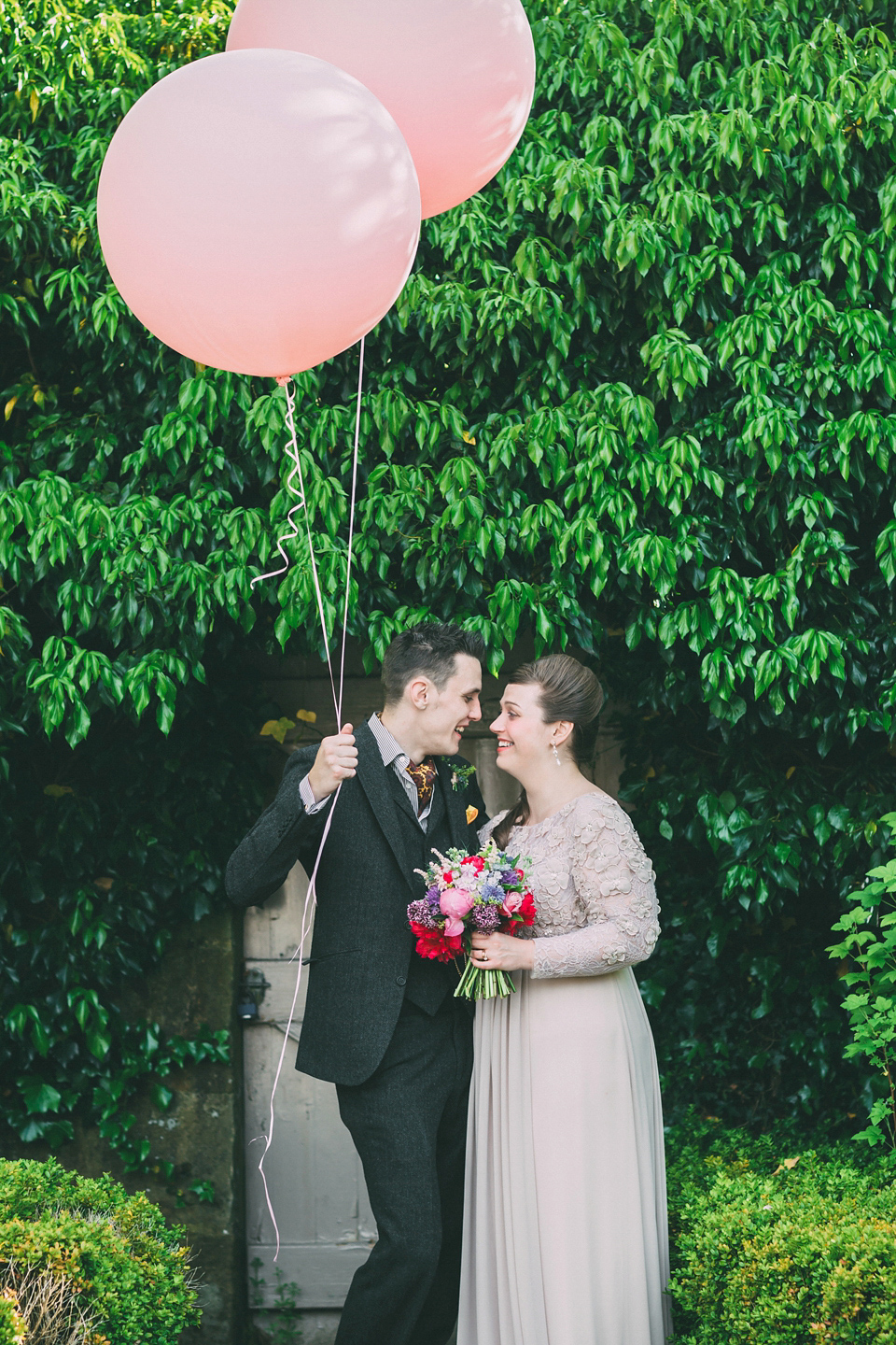 Pompoms, Giant Balloons and a Garden Party for a Delightful Child Friendly Wedding. Photography by Rooftop Mosaic.