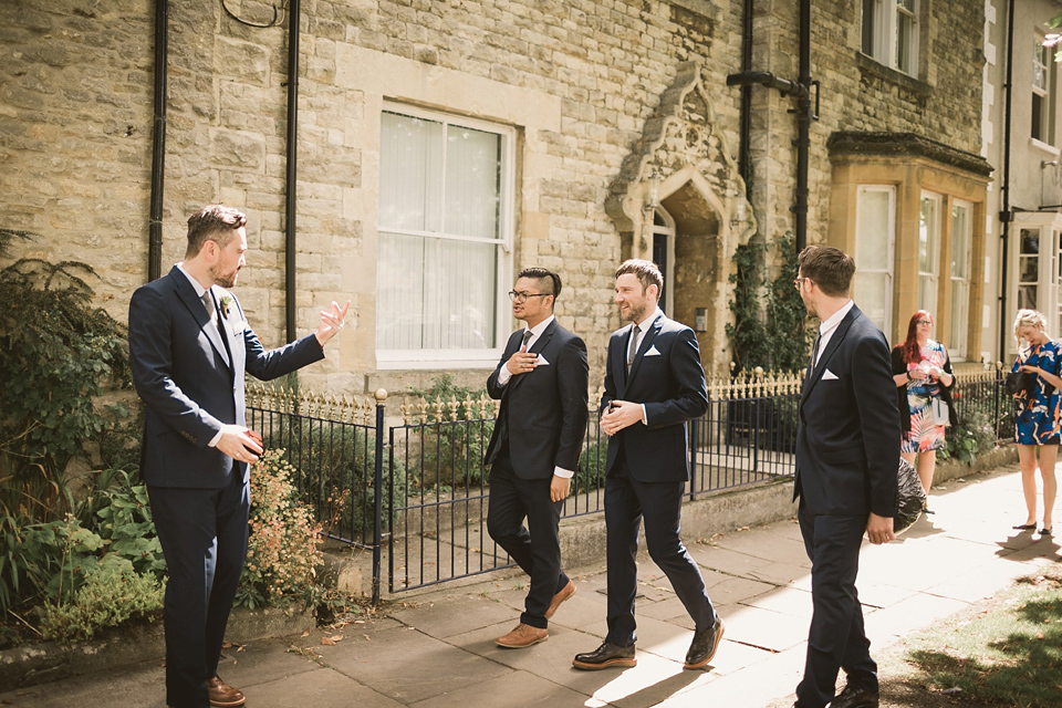 An elegant English countryside barn wedding in Oxfordshire. Photography by Tom Ravenshear. The bride wears a dress by designer Sienna Von Hildemar