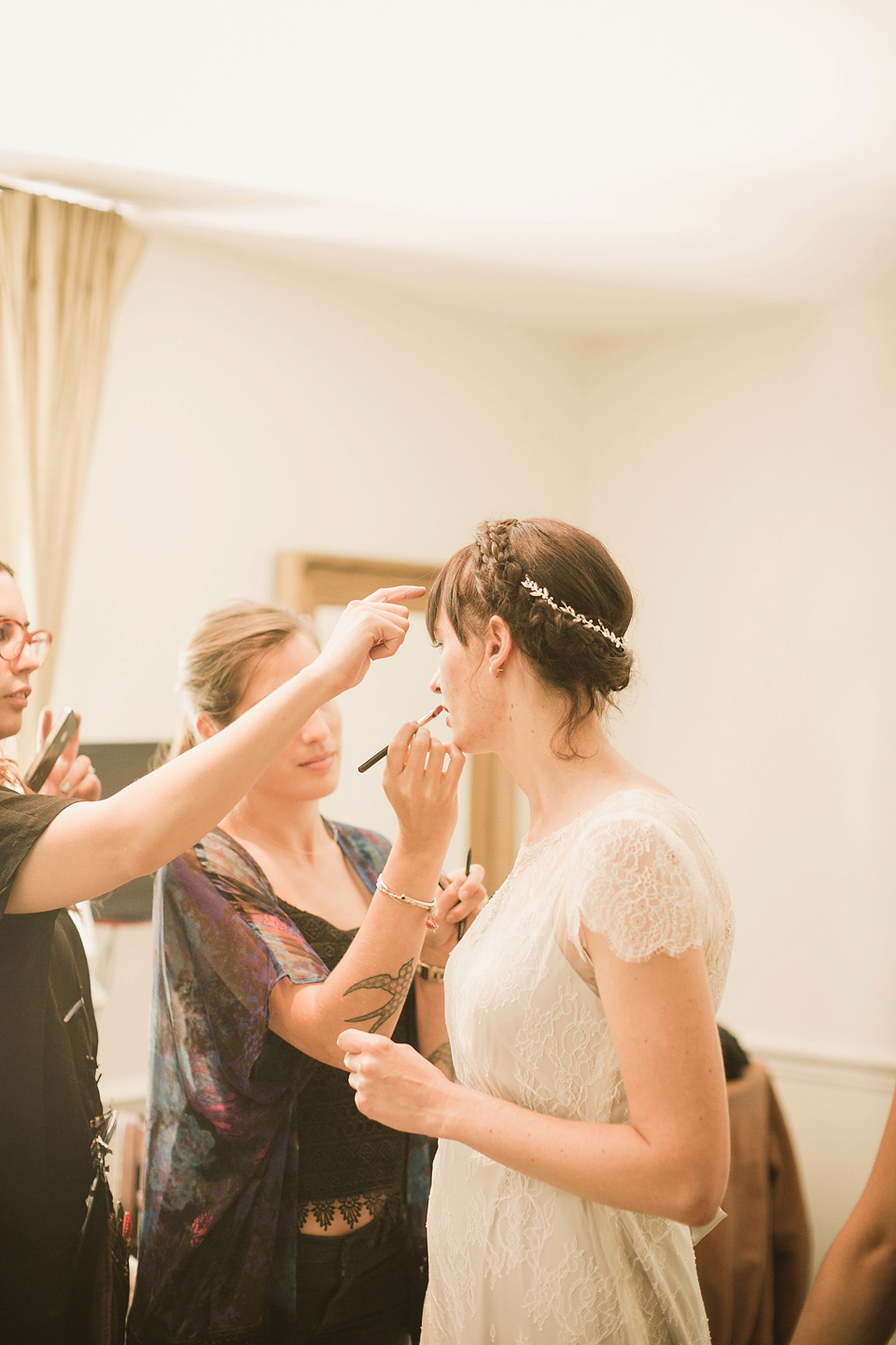 An elegant English countryside barn wedding in Oxfordshire. Photography by Tom Ravenshear. The bride wears a dress by designer Sienna Von Hildemar