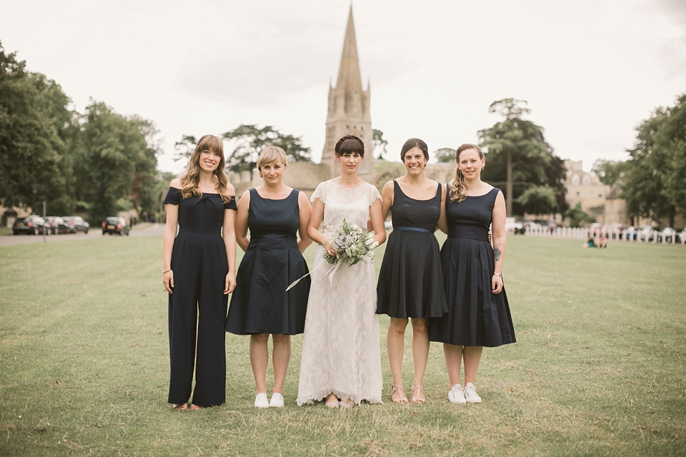 An elegant English countryside barn wedding in Oxfordshire. Photography by Tom Ravenshear. The bride wears a dress by designer Sienna Von Hildemar