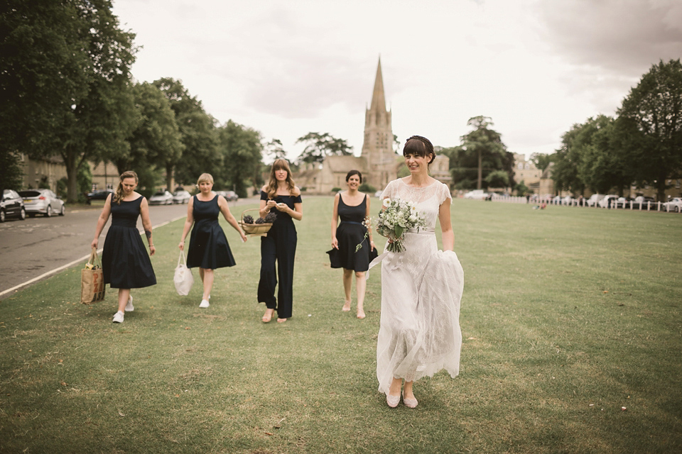 An elegant English countryside barn wedding in Oxfordshire. Photography by Tom Ravenshear. The bride wears a dress by designer Sienna Von Hildemar