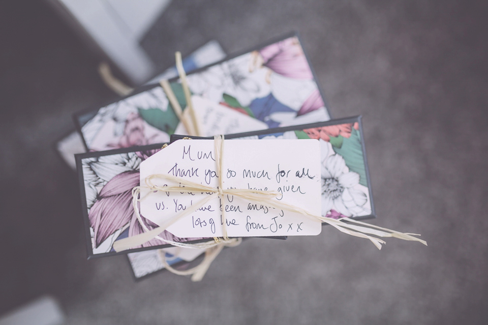 Bride Jo wears a Claire Pettibone gown and vintage tiara for her colourful, homespun and humanist wedding celebration. Photography by Naomi Jane Photography.