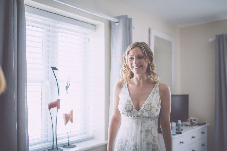 Bride Jo wears a Claire Pettibone gown and vintage tiara for her colourful, homespun and humanist wedding celebration. Photography by Naomi Jane Photography.