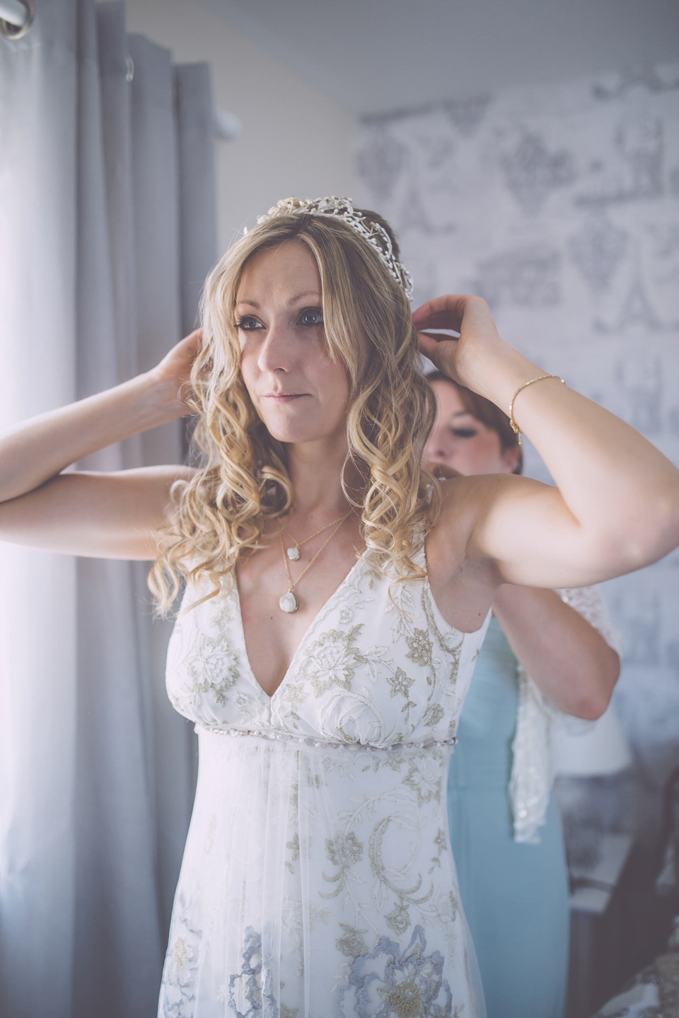 Bride Jo wears a Claire Pettibone gown and vintage tiara for her colourful, homespun and humanist wedding celebration. Photography by Naomi Jane Photography.