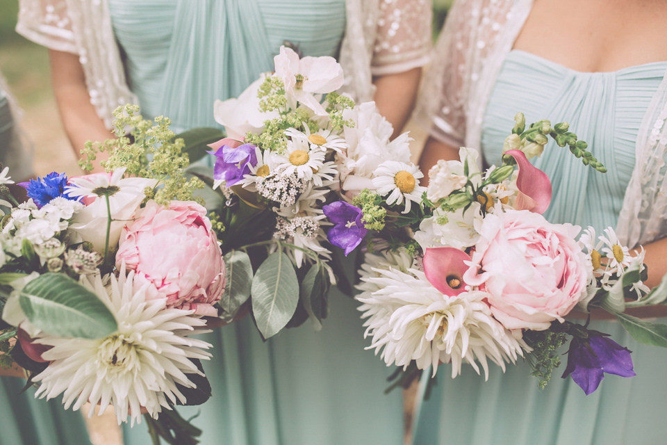 Bride Jo wears a Claire Pettibone gown and vintage tiara for her colourful, homespun and humanist wedding celebration. Photography by Naomi Jane Photography.