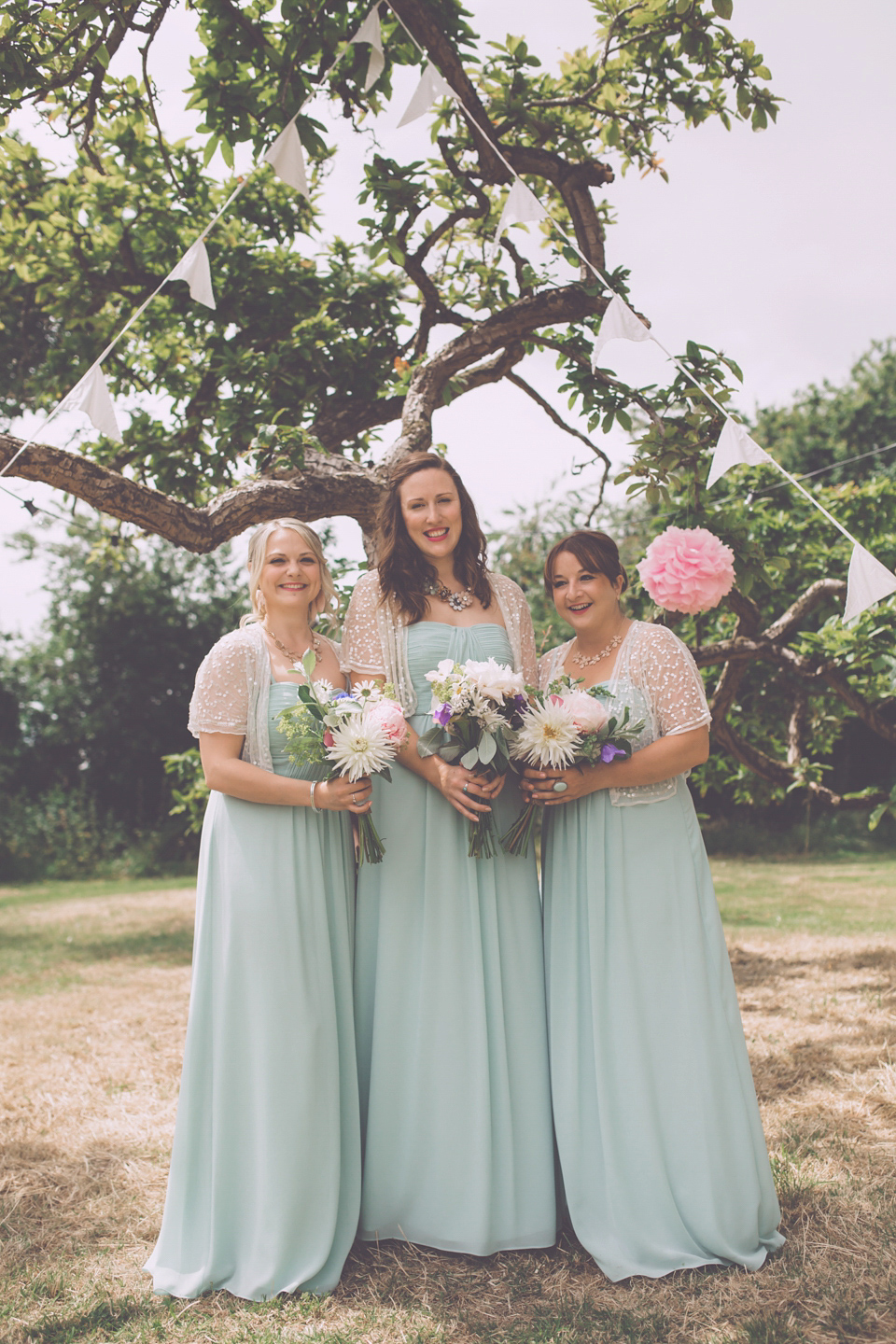 Bride Jo wears a Claire Pettibone gown and vintage tiara for her colourful, homespun and humanist wedding celebration. Photography by Naomi Jane Photography.