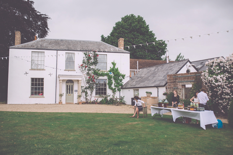 Bride Jo wears a Claire Pettibone gown and vintage tiara for her colourful, homespun and humanist wedding celebration. Photography by Naomi Jane Photography.