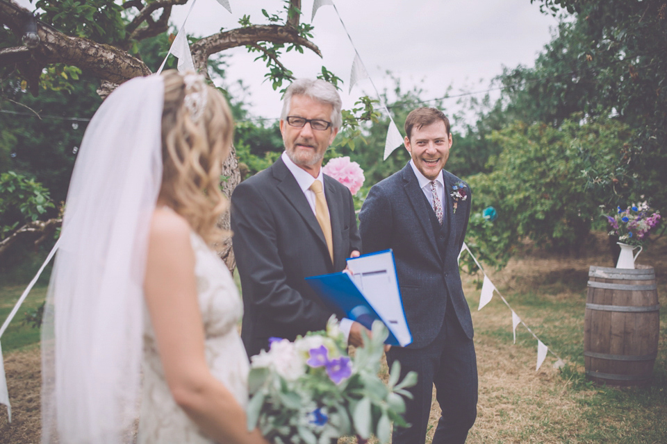 Bride Jo wears a Claire Pettibone gown and vintage tiara for her colourful, homespun and humanist wedding celebration. Photography by Naomi Jane Photography.