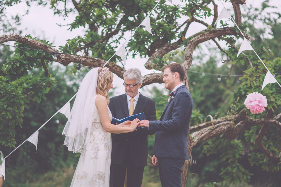 Bride Jo wears a Claire Pettibone gown and vintage tiara for her colourful, homespun and humanist wedding celebration. Photography by Naomi Jane Photography.