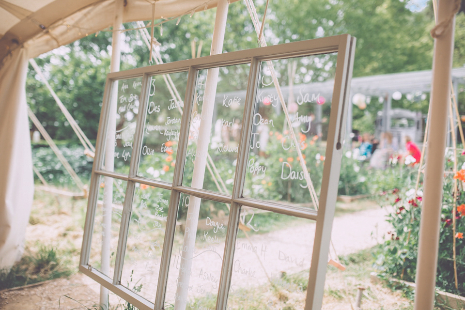 Bride Jo wears a Claire Pettibone gown and vintage tiara for her colourful, homespun and humanist wedding celebration. Photography by Naomi Jane Photography.