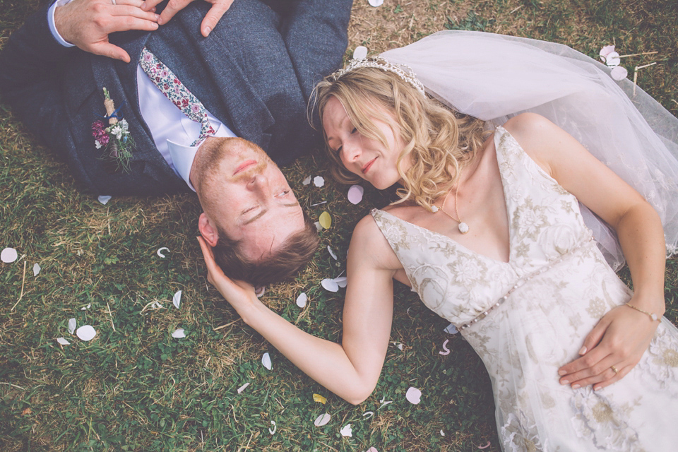 Bride Jo wears a Claire Pettibone gown and vintage tiara for her colourful, homespun and humanist wedding celebration. Photography by Naomi Jane Photography.