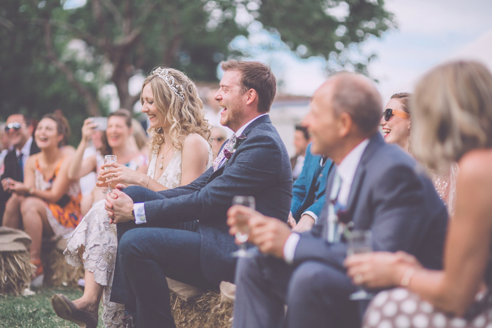 Bride Jo wears a Claire Pettibone gown and vintage tiara for her colourful, homespun and humanist wedding celebration. Photography by Naomi Jane Photography.