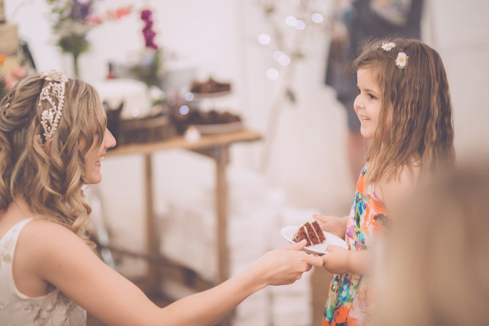 Bride Jo wears a Claire Pettibone gown and vintage tiara for her colourful, homespun and humanist wedding celebration. Photography by Naomi Jane Photography.