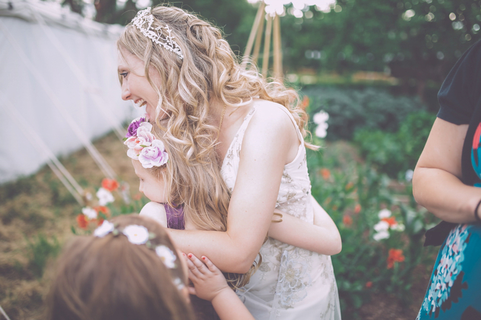 Bride Jo wears a Claire Pettibone gown and vintage tiara for her colourful, homespun and humanist wedding celebration. Photography by Naomi Jane Photography.